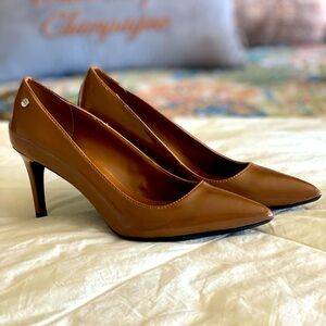 Calvin Klein, beige heels. 8